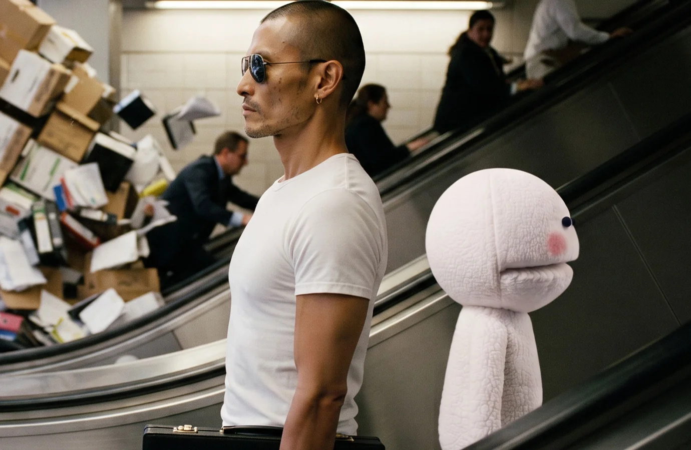 George and CVS on an escalator
